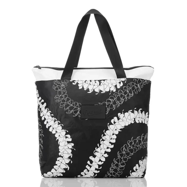 DT_puakenikeni_white_on_black_flap_up_front-op
